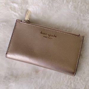 Kate spade wallet in gold champagne